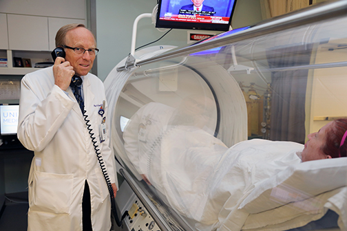 Dr. Paul Harch with patient in hyperbaric chamber
